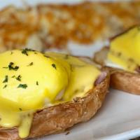 Eggs Benny · English muffin, Canadian bacon, poached eggs, hollandaise.