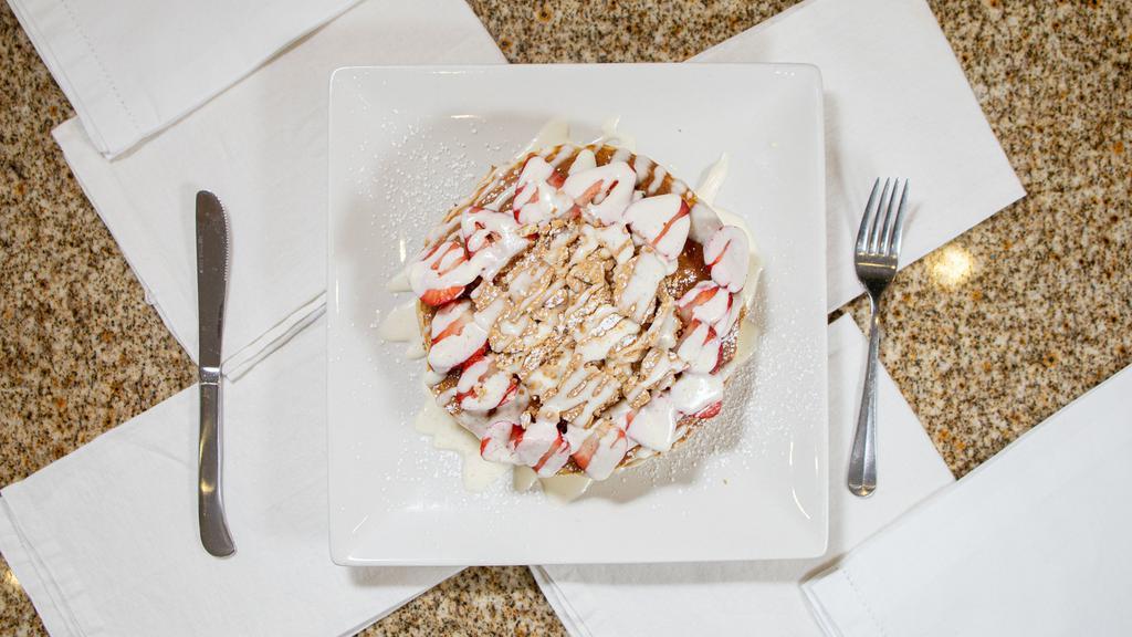 Strawberry Cheesecake · Fresh strawberries, cream cheese glaze, graham cracker crumbles.
