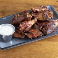 Chicken Wings · Smoked, flash fried, option to be tossed ( dry rub, spicy BBQ, Carolina, or Buffalo)