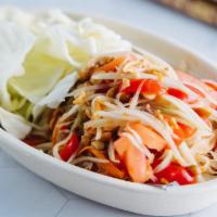 Green Papaya Salad · Papaya, carrots, tomatoes, and lime | Thai style add crushed peanuts | Lao style crab paste