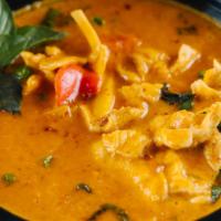 Red Curry · Creamy red curry with Thai basil, peas, bamboo, & bell peppers. Served with Jasmine Rice.