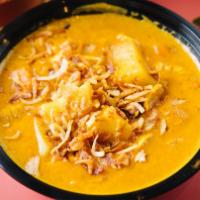 Yellow Curry · Creamy yellow curry with potatoes, white onions, carrots, & topped with fried onions. Served...