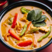 Panang Curry · Creamy panang curry with kafir lime leaves and bell peppers. Served with Jasmine Rice.
