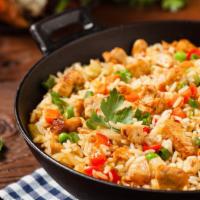 Chicken Fried Rice · Classic soy sauce stir-fried rice with bits of succulent chicken topped with spring onions.