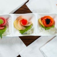 The Blue Fish Trio · 3pcs of tuna, salmon, red snapper, served with sesame oil, wasabi mayo, and assorted caviars