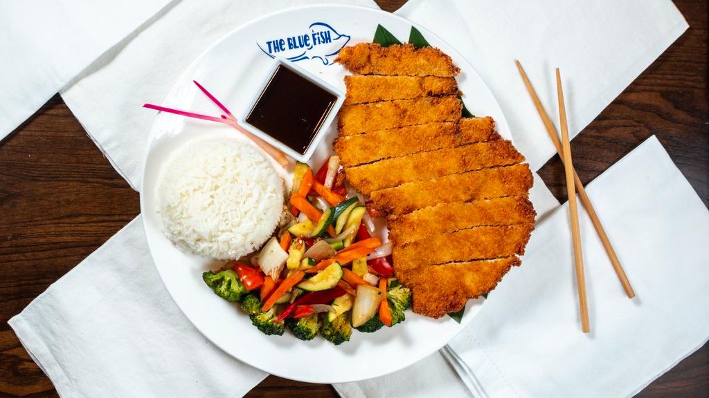 Chicken Katsu · Panko encrusted and lightly fried chicken breast. Served with sauteed vegetables, white or brown rice, and katsu sauce.