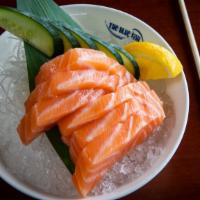 Sashimi Salad · 2 pieces of snapper, salmon, tuna, and shrimp, over squid salad, spring mix, napa cabbage, r...