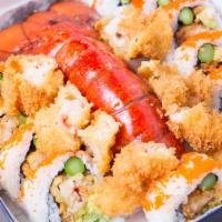 Mega Lobster Roll · 7 oz. Lobster Tail panko encrusted, asparagus, cucumber, avocado, Masago, spicy and lobster ...