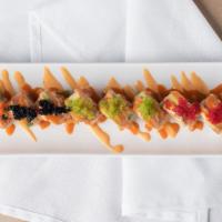 Stardust Roll · Spicy. Shrimp tempura, crab meat, spicy sauce, topped with spicy tuna mix, avocado and vario...