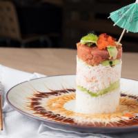 Ahi Tower · Sushi rice, ripe avocado, cucumber, crab meat plus spicy tuna and masago to top it off. serv...