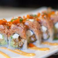 Spicy Salmon Torch Roll · Spicy. A charbroiled aroma spicy roll with shrimp tempura, cream cheese and avocado topped w...