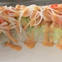 Thai Lucky Roll · Eel, salmon, avocado wrapped in rice with spicy mayo on top.