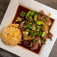 E16 Pepper Steak · Sliced beef steak sautéed with sliced bell peppers and onion. All entrees served with steame...