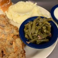 Chicken Fried Steak · Hand battered premium angus beef, then deep fried to perfection. Served with our gravy, two ...