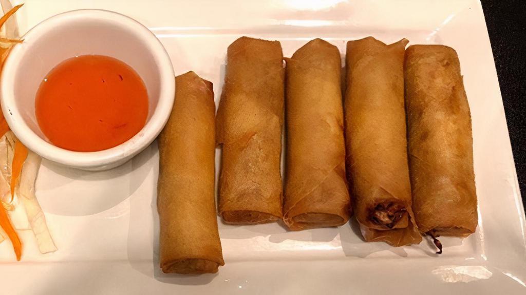 Crispy Spring Rolls (5 Pcs) · Fried Thai veggie rolls, served with sweet and sour sauce.