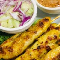 Chicken Satay (4 Pcs) · Grilled marinated chicken on a skewer. Served with sweet Thai peanut sauce, cucumber salad .