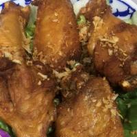 Tyk Chicken Wings (5 Pcs) · Fried chicken wings with house special seasoning.