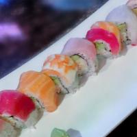 Rainbow Roll · California roll topped with yellowtail, tuna, salmon, shrimp and avocado.