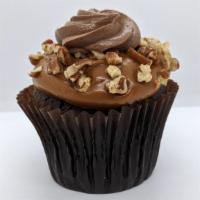 Caramel Turtle · Chocolate Cake with Caramel Icing and Chocolate Fudge Swirl Garnished with Pecans
