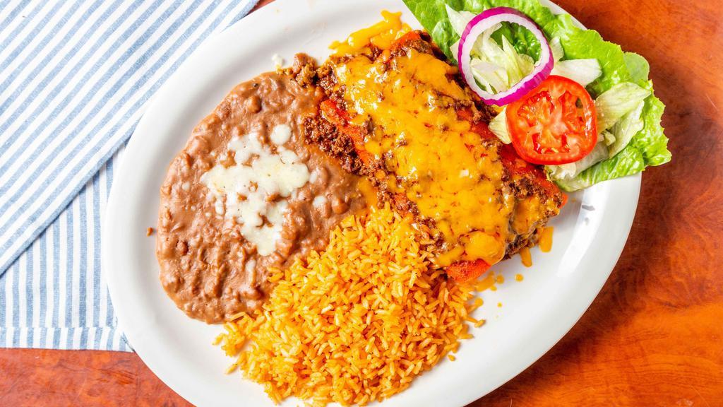 Enchiladas Tex-Mex · 2 Enchiladas, Rice, Bean, & Salad. Choose one protein inside (Cheese, Ground Beef, Chicken or Shrimps) Choose one topping (Red Sauce, Green Sauce, Sour Cream, or Chile con carne)
