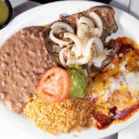 Tampiqueña · Tenderized beef steak marinated. Served with two enchiladas, guacamole, rice and beans.