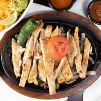 Fajitas De Pollo · Chicken fajita grilled with onions, bell peppers, grilled peppers. Served with rice, beans, ...