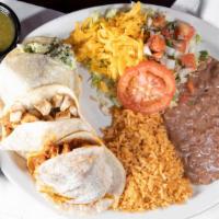 Gordita Plate · Handmade corn pitas with your choice of meat. Served with rice, beans & salad.