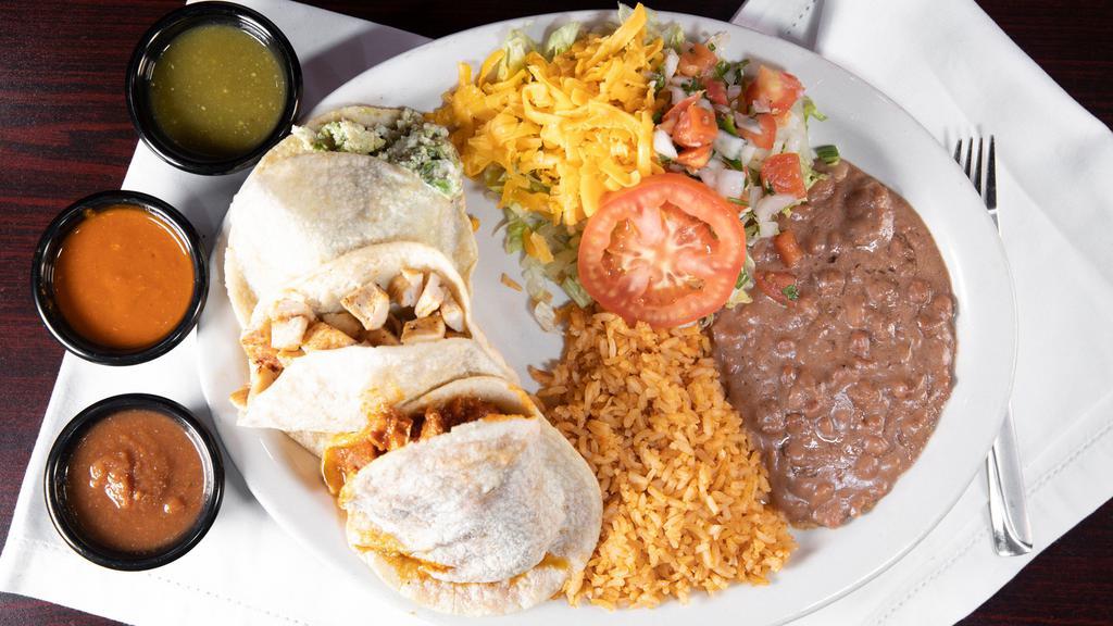 Gordita Plate · Handmade corn pitas with your choice of meat. Served with rice, beans & salad.