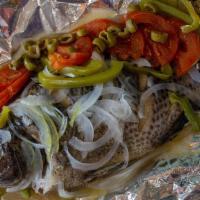 Mojarra Empapelada · baked in foil with onions, olives, bell peppers and butter