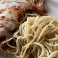 Chicken Parmigiana · Lightly breaded topped with mozzarella & Giovanni's tomato sauce.