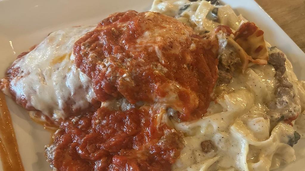 Italian Tour · Chicken parmesan, fettuccine alfredo & meat lasagna.