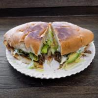 Tortas · White bread with refried beans, choice of meat lettuce, tomato, avocado and sour-cream. (Pre...