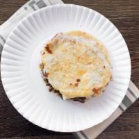 Gorditas · Thick handmade corn tortilla stuffed with refied beans, choice of meat and cheese. (Preparad...