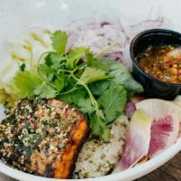 Ds Salmon Rice Bowl · coconut scented rice, seasonal pickled vegetables, thai herbs. **soy, garlic, sesame