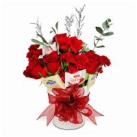 Roses And Chocolate - Designers Choice · An assortment of fresh cut flowers and our finest chocolate in a decorative vase. 

*Color s...
