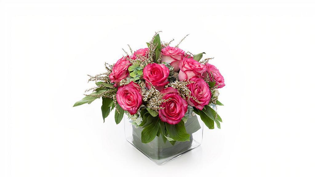 Pink Roses · 1 Dozen Pink Roses beautifully arranged in a clear glass vase. 
We are sold out of the pictured Square Vases.
Please choose a Rose Style below
