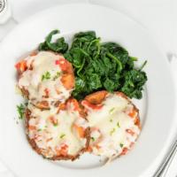 Eggplant Parmesan · Vegetarian. Fresh eggplant medallions topped with roasted tomatoes and mozzarella cheese, se...