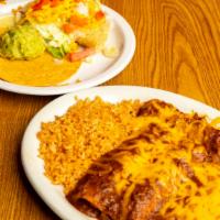 Mexicali Dinner · Two beef enchiladas covered with chili con carne, one beef taco, one beef tamale covered wit...