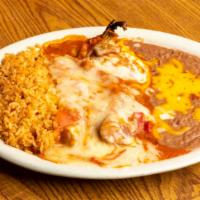 Chili Relleno · Poblano pepper stuffed with beef or chicken and Monterrey jack cheese served with Mexican st...