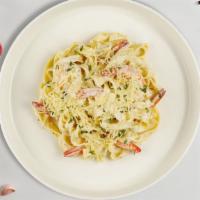 Creamy Alfredo Shrimp Pasta (Fettuccine) · Fresh fettuccine pasta served with a creamy alfredo sauce and shrimp.