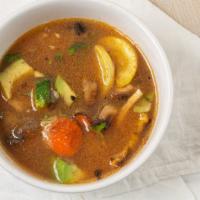 Azteca Soup · Traditional chicken broth with chicken, sautéed vegetables, rice, avocado, and Monterey jack...