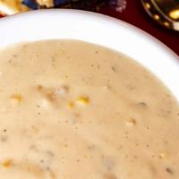 Crawfish Bisque · A sweet and delectable creamy bisque filled with chopped crawfish tail meat.