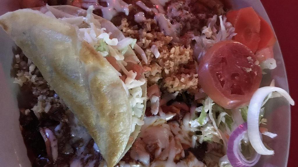 Mexican Plate No. 1 · 1 taco, 1 enchilada, 1 chile relleno, rice and beans.