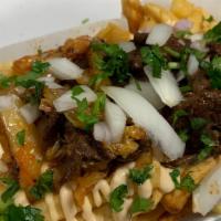 Kimchi Fries · Shoestring fries with ribeye Bulgogi, kimchi, chopped onions and cilantro. Spacy mayo drizzl...