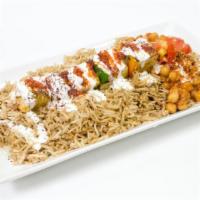 Cheese Kebab Plate · Cheese Kebab over your choice of any two sides, yogurt sauce, cilantro sauce, and seasonings!