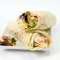 Cheese Kebab Wrap · Cheese Kebab wrapped up in a lavash bread along with spring mix, tomatoes, onions, yogurt sa...