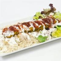 Falafel Plate · Grilled Falafel over your choice of any two sides, yogurt sauce, cilantro sauce, and seasoni...