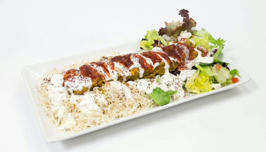 Falafel Plate · Grilled Falafel over your choice of any two sides, yogurt sauce, cilantro sauce, and seasonings!