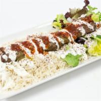 Beef Kobida Kebab Plate · Beef Kobida Kebab over your choice of any two sides, yogurt sauce, cilantro sauce, and seaso...