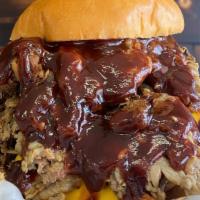 Sooie Mooie · Cheeseburger with Pulled Pork and Brisket.